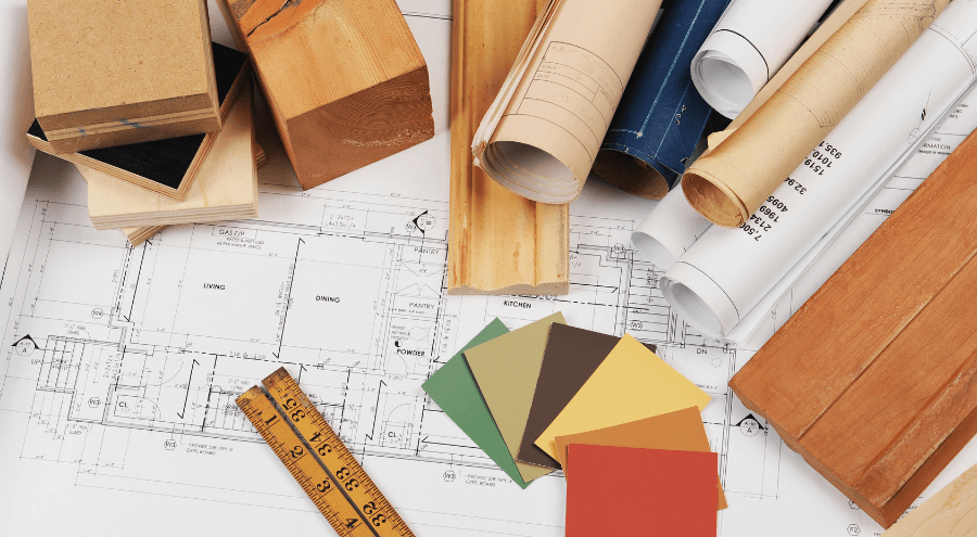 Renoveringsplanering med ritningar och materialprover